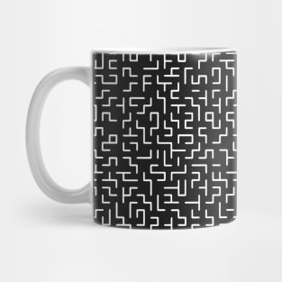 White lines of a classic maze pattern Mug